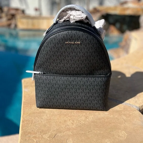 Michael Kors Black Perforated MK Logo Mini Backpack s-l400.jpg main image 3